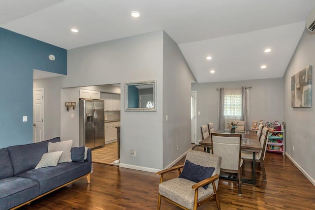 51 Andrews Ave, Wyandanch, NY 11798 - living area featuring wood finished floors, vaulted ceiling, recessed lighting, and a wall unit AC