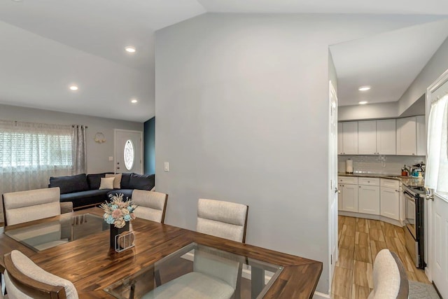 51 Andrews Ave, Wyandanch, NY 11798 - dining area featuring recessed lighting, light wood-style flooring, and vaulted ceiling