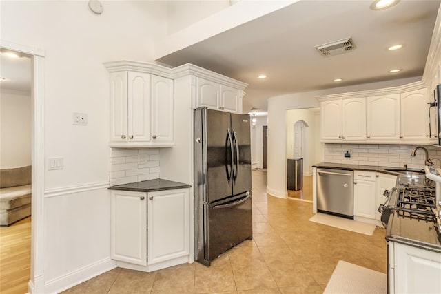721 3rd Ave, East Northport, NY 11731 - kitchen featuring dishwasher, freestanding refrigerator, a sink, backsplash, and recessed lighting
