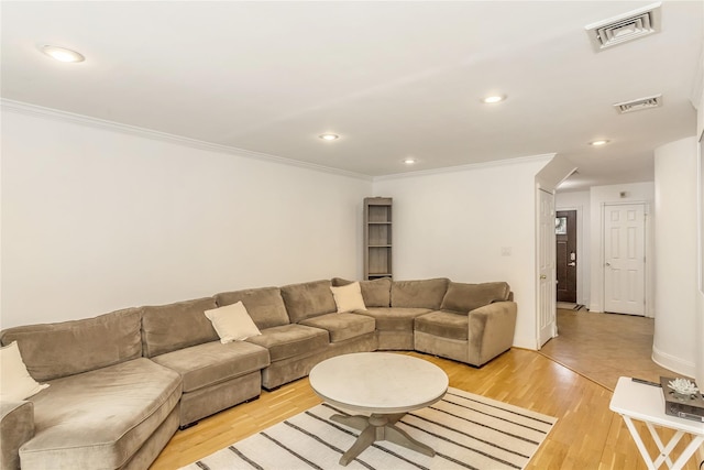 721 3rd Ave, East Northport, NY 11731 - living area featuring crown molding, light wood finished floors, and recessed lighting