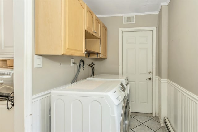 721 3rd Ave, East Northport, NY 11731 - laundry room featuring washing machine and clothes dryer, cabinet space, baseboard heating, wainscoting, and light tile patterned floors