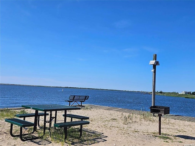 view of property's community featuring a water view