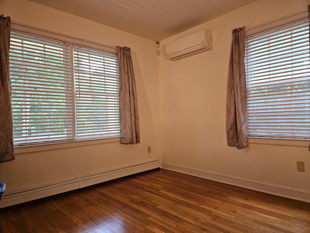 10 Phyllis Rd, Mastic Beach, NY 11951 - empty room featuring a wall mounted air conditioner, a baseboard radiator, wood-type flooring, and baseboards