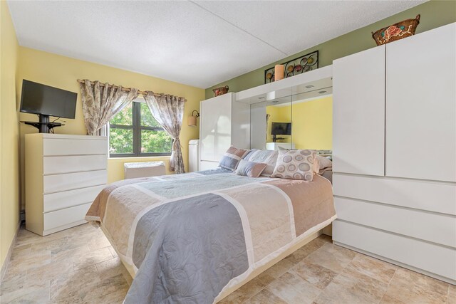 71-28 Sutton Pl Unit 3, Flushing, NY 11365 - bedroom featuring stone finish flooring