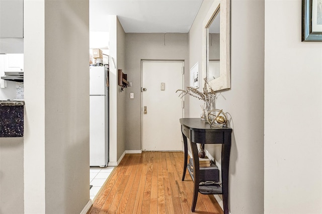 87-30 62nd Ave Unit 202, Rego Park, NY 11375 - hall featuring light wood finished floors