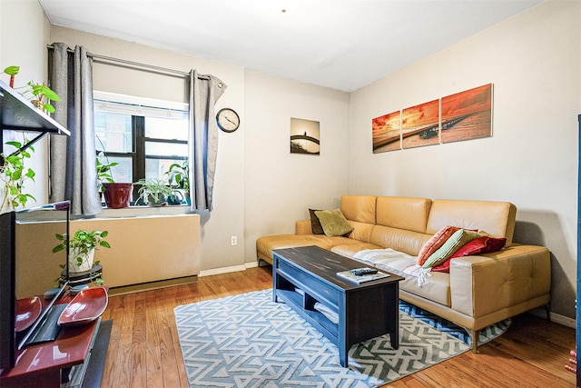 87-30 62nd Ave Unit 202, Rego Park, NY 11375 - living room featuring wood finished floors and baseboards