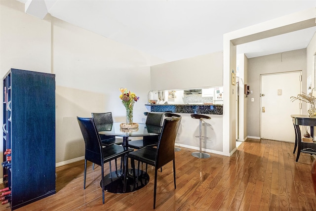 87-30 62nd Ave Unit 202, Rego Park, NY 11375 - dining area featuring wood-type flooring and baseboards