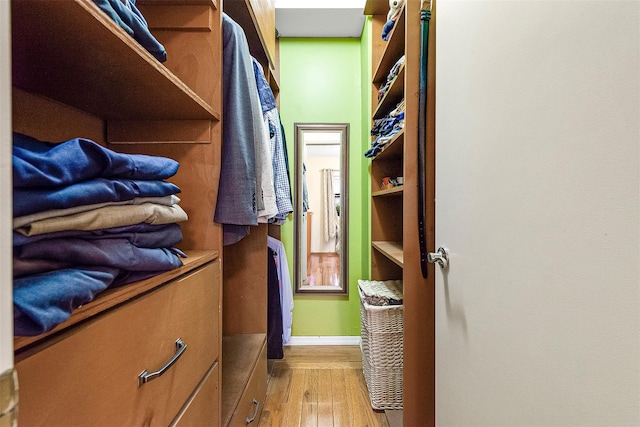 87-30 62nd Ave Unit 202, Rego Park, NY 11375 - walk in closet with light wood finished floors