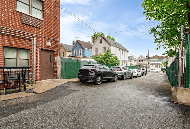 87-30 62nd Ave Unit 202, Rego Park, NY 11375 - view of vehicle parking featuring a residential view