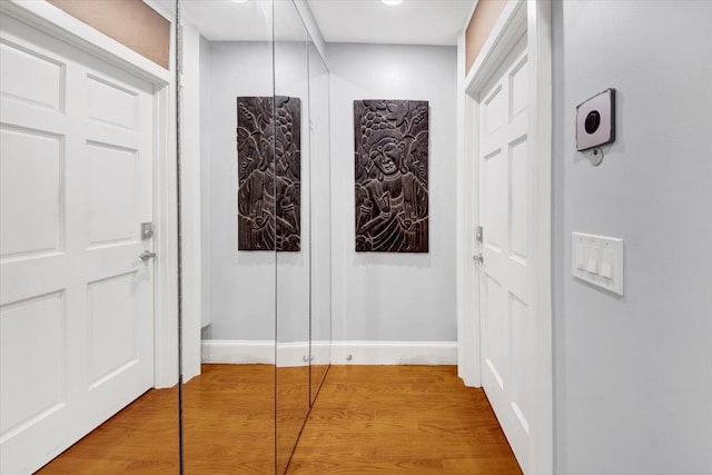 1185 Anderson Ave Unit 1F, Bronx, NY 10452 - hallway with baseboards and wood finished floors
