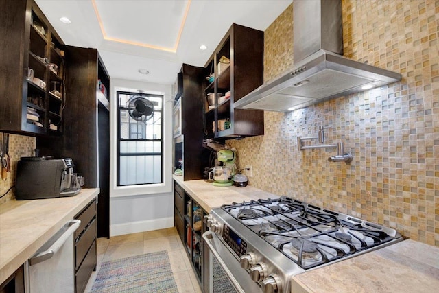 1185 Anderson Ave Unit 1F, Bronx, NY 10452 - kitchen featuring wall chimney range hood, stainless steel appliances, light countertops, open shelves, and recessed lighting