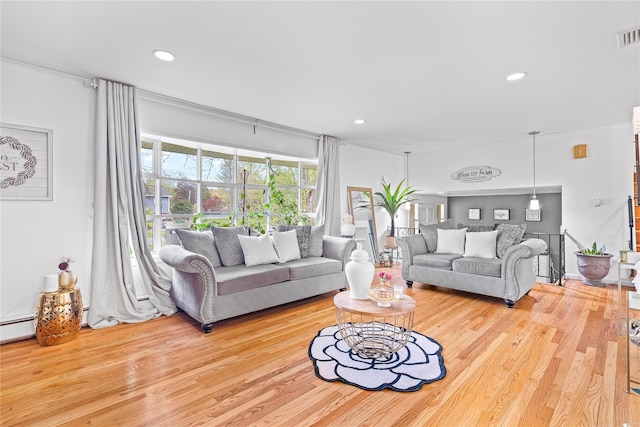 63 Wright Blvd, Hopewell Junction, NY 12533 - living room featuring wood finished floors and recessed lighting