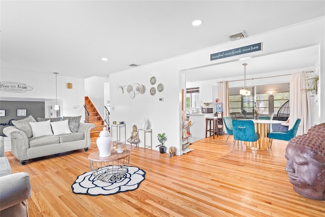 63 Wright Blvd, Hopewell Junction, NY 12533 - living area featuring wood finished floors, recessed lighting, and stairs