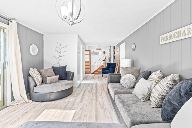 63 Wright Blvd, Hopewell Junction, NY 12533 - living area featuring stairs, wooden walls, wood finished floors, and a chandelier
