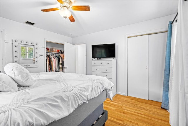 63 Wright Blvd, Hopewell Junction, NY 12533 - bedroom featuring light wood-style flooring, two closets, and a ceiling fan