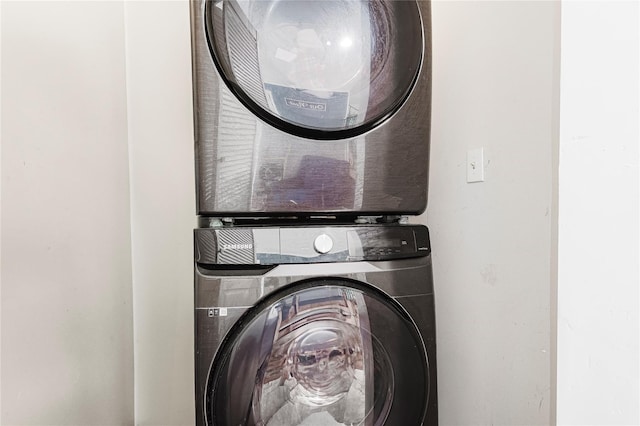63 Wright Blvd, Hopewell Junction, NY 12533 - laundry area with stacked washer and clothes dryer