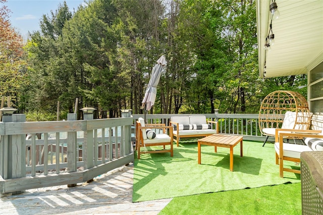 63 Wright Blvd, Hopewell Junction, NY 12533 - wooden terrace with view of scattered trees and an outdoor hangout area