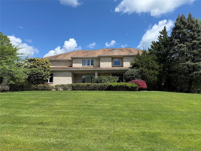 1 Deforest Ct, West Nyack, NY 10994 - view of front facade with a front yard and brick siding