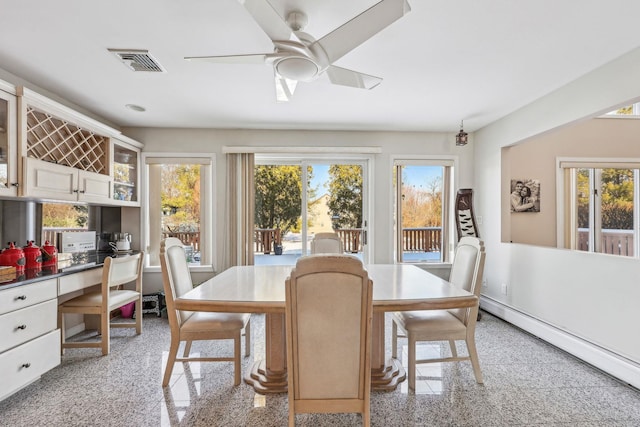 1 Deforest Ct, West Nyack, NY 10994 - dining room with a baseboard radiator and a ceiling fan