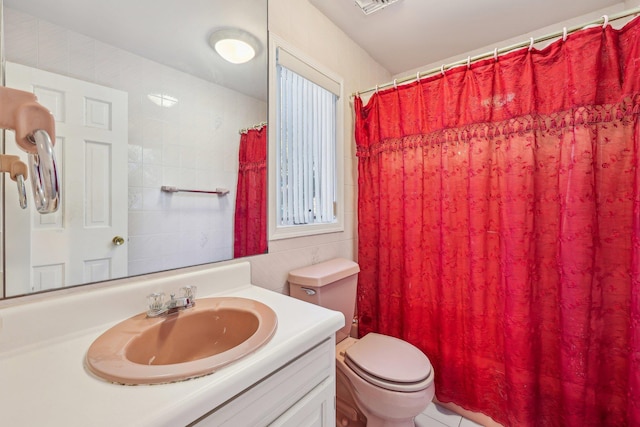 1 Deforest Ct, West Nyack, NY 10994 - bathroom featuring toilet, vanity, tile walls, and a shower with shower curtain