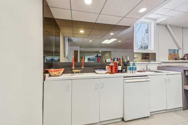 1 Deforest Ct, West Nyack, NY 10994 - kitchen featuring dishwasher, a sink, white cabinets, light countertops, and recessed lighting