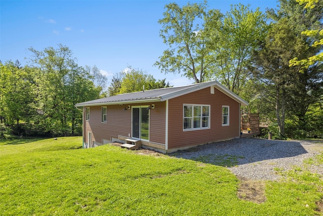 2 Mountain View Pl N, New Paltz, NY 12561 - back of house featuring a yard and metal roof