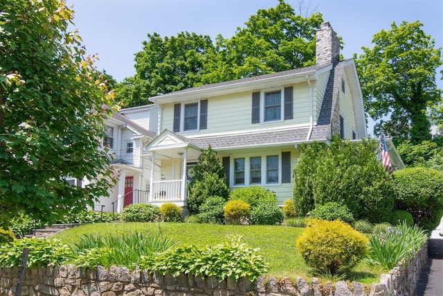 238 Read Ave, Tuckahoe, NY 10707 - view of front of house with a chimney and roof with shingles