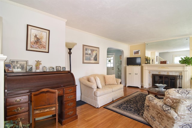 238 Read Ave, Tuckahoe, NY 10707 - living area with wood finished floors, arched walkways, healthy amount of natural light, and ornamental molding