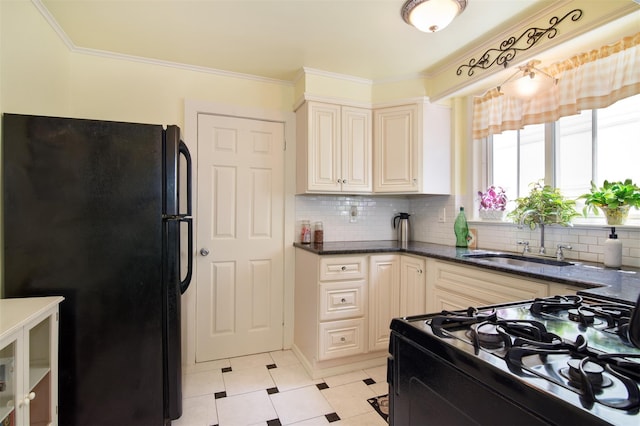 238 Read Ave, Tuckahoe, NY 10707 - kitchen featuring black appliances, cream cabinetry, backsplash, ornamental molding, and a sink