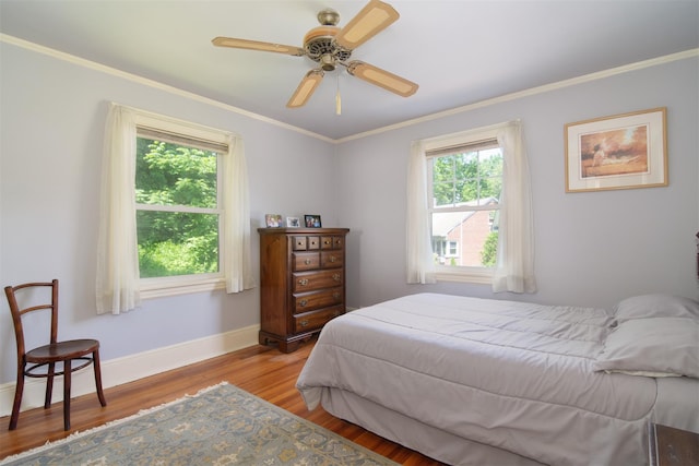 238 Read Ave, Tuckahoe, NY 10707 - bedroom with multiple windows, wood finished floors, ornamental molding, baseboards, and a ceiling fan