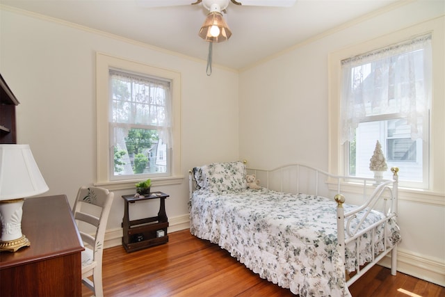 238 Read Ave, Tuckahoe, NY 10707 - bedroom featuring multiple windows, wood finished floors, baseboards, crown molding, and a ceiling fan