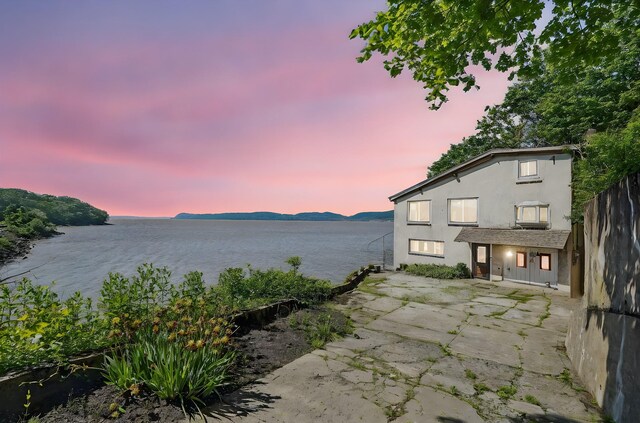 1 Battery Pl, Croton-On-Hudson, NY 10520 - patio terrace at dusk with a water view and a patio