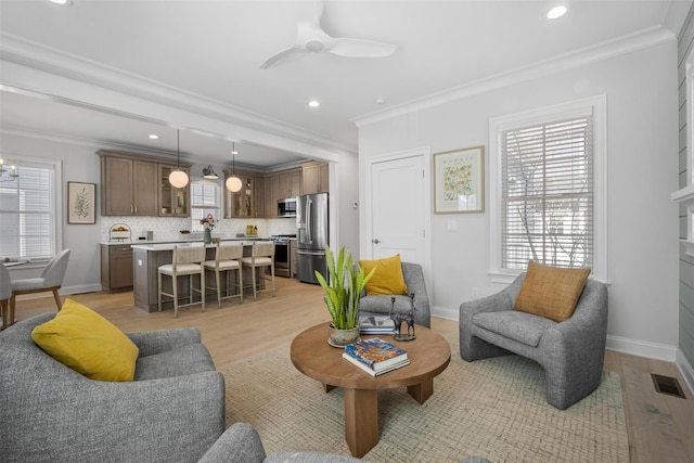 6 Livingston St, Red Hook, NY 12571 - living room featuring light wood finished floors, crown molding, ceiling fan, recessed lighting, and baseboards