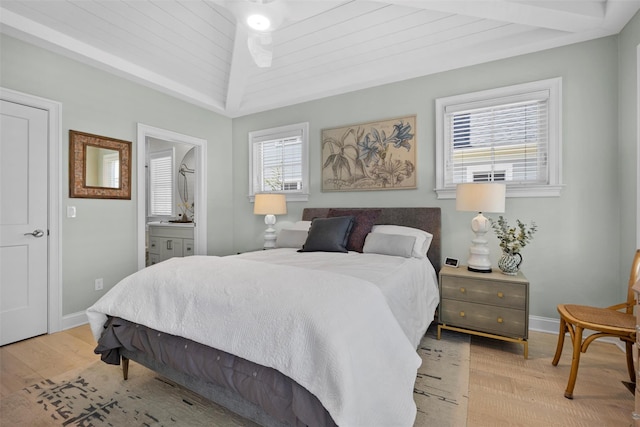 6 Livingston St, Red Hook, NY 12571 - bedroom with light wood finished floors, baseboards, and connected bathroom