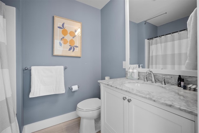 6 Livingston St, Red Hook, NY 12571 - bathroom featuring vanity, toilet, baseboards, and wood finished floors