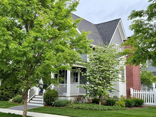 6 Livingston St, Red Hook, NY 12571 - view of front of house featuring a porch and a shingled roof