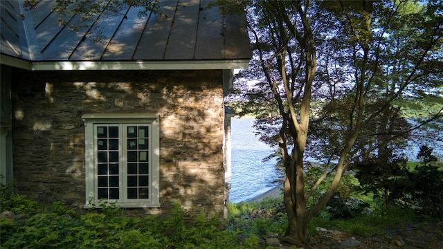 70 Floyd Ackert Rd, West Park, NY 12429 - view of side of property with a standing seam roof, stone siding, and metal roof