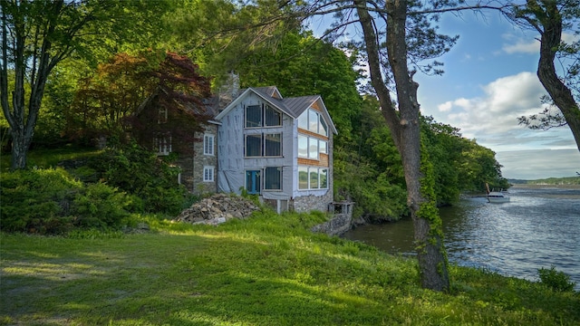 70 Floyd Ackert Rd, West Park, NY 12429 - view of side of home with a water view, a chimney, and metal roof