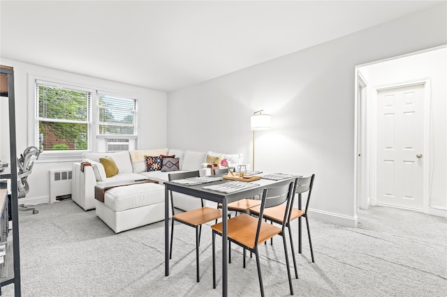5 Bryant Cres Unit 1B, White Plains, NY 10605 - dining room with radiator, carpet flooring, and baseboards