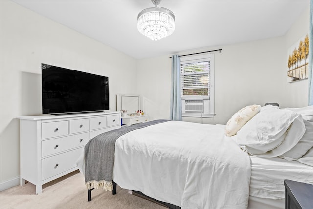 5 Bryant Cres Unit 1B, White Plains, NY 10605 - bedroom featuring a chandelier, light colored carpet, cooling unit, and baseboards