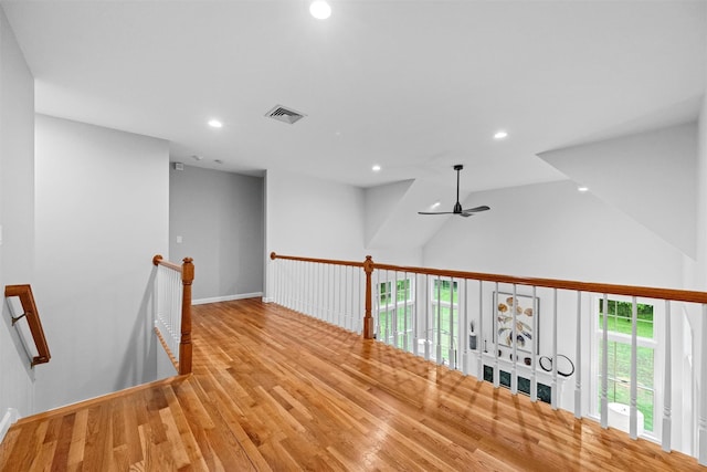 56 Londonderry Ln, Somers, NY 10589 - hallway featuring an upstairs landing, wood finished floors, recessed lighting, vaulted ceiling, and baseboards
