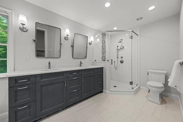 56 Londonderry Ln, Somers, NY 10589 - bathroom featuring a stall shower, double vanity, toilet, recessed lighting, and baseboards
