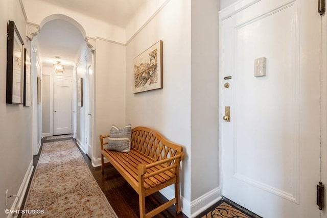 31 Pondfield Rd W Unit 68, Bronxville, NY 10708 - hallway with dark wood-style flooring and baseboards