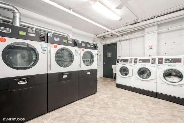 31 Pondfield Rd W Unit 68, Bronxville, NY 10708 - shared laundry room featuring independent washer and dryer, tile patterned floors, and estacked washer and dryer