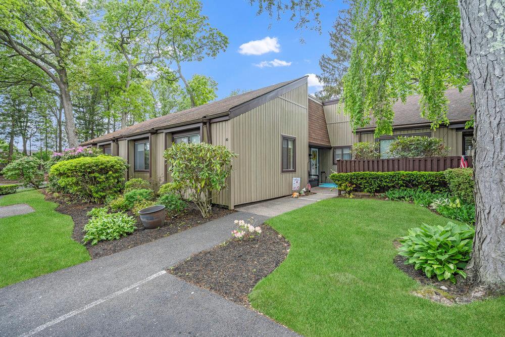 80 Strathmore Gate Dr, Stony Brook, NY 11790 - mid-century inspired home featuring a front lawn and a shingled roof