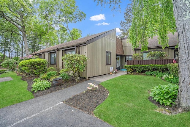 80 Strathmore Gate Dr, Stony Brook, NY 11790 - mid-century inspired home featuring a front lawn and a shingled roof