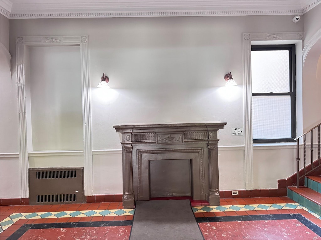 1845 82nd St Unit C3, Brooklyn, NY 11214 - tiled living room with heating unit, stairway, a fireplace with flush hearth, and baseboards