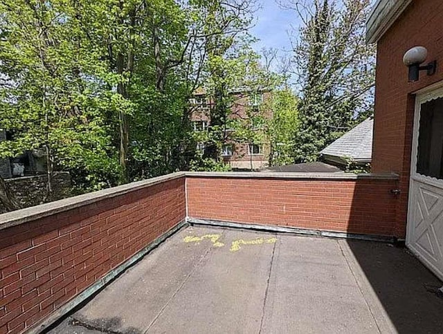 view of patio / terrace with a balcony