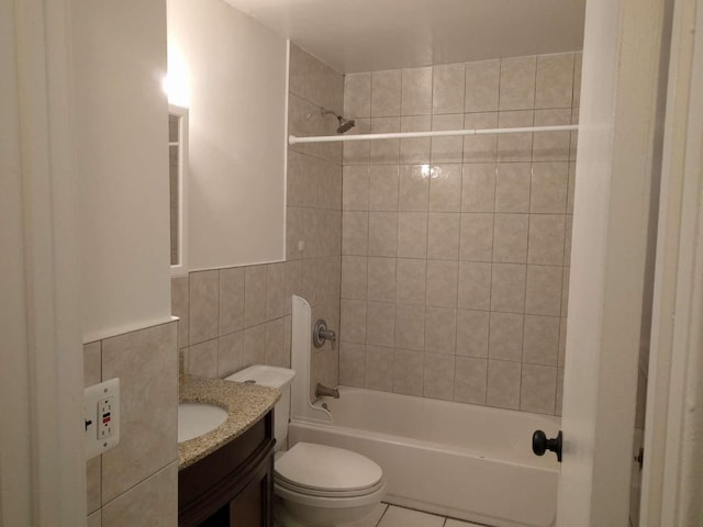 5465 Sylvan Ave, Bronx, NY 10471 - bathroom with toilet, tile walls, vanity, and shower / washtub combination