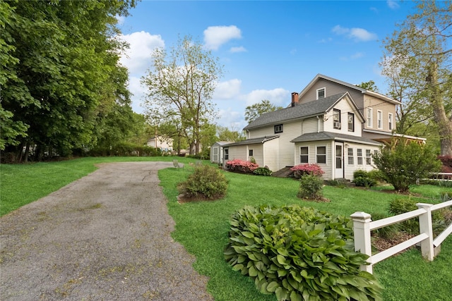 35 Fallkill Ave, Poughkeepsie, NY 12601 - view of property exterior with a chimney